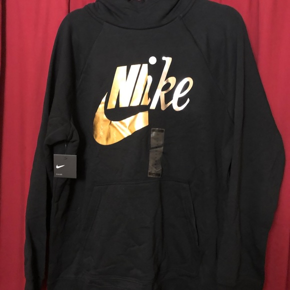 gold and silver nike jacket